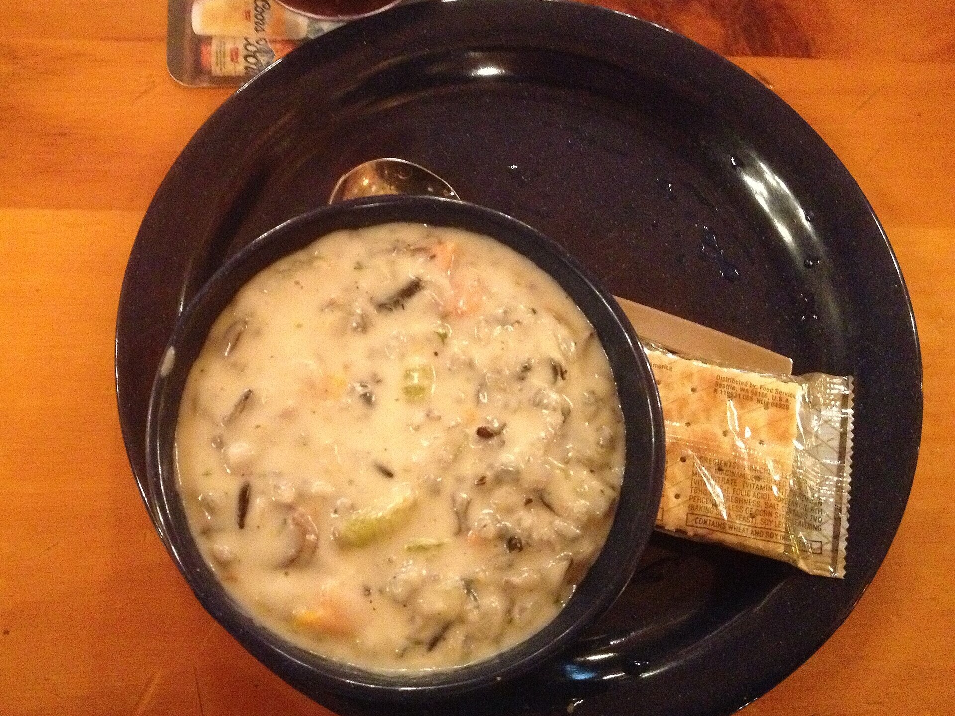 Freezer meals for new moms: a bowl of creamy chicken and wild rice soup