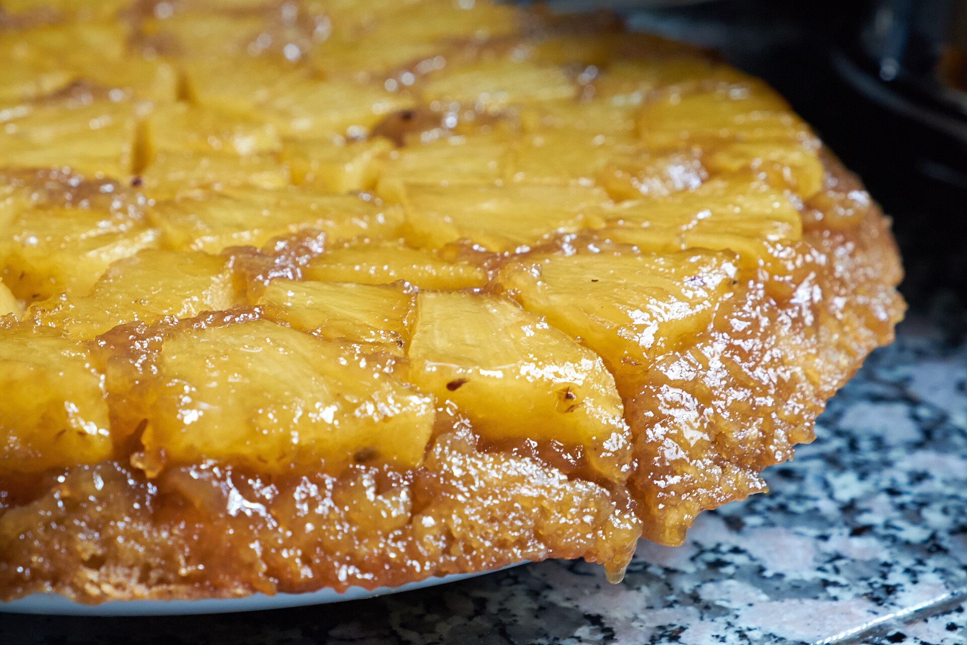 Pineapple upside-down cake with golden caramelized pineapple