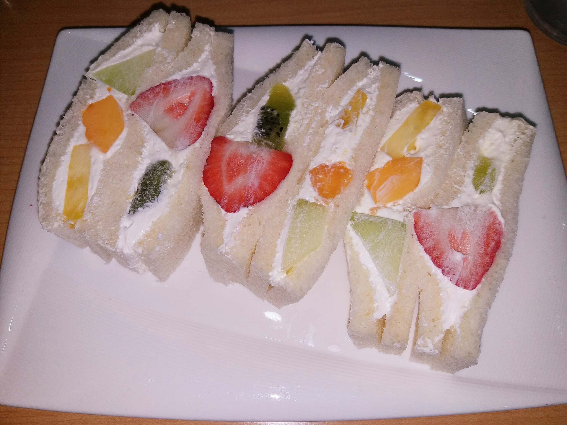 Fruit sandwiches with strawberries and cream