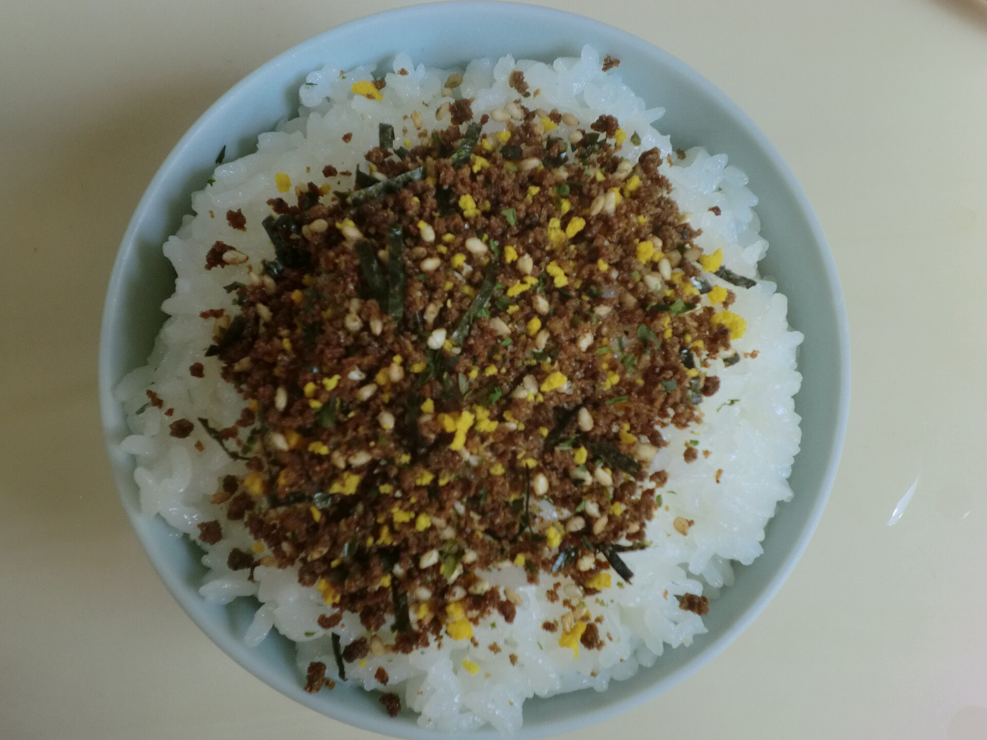 Japanese breakfast rice sprinkled with furikake in a bowl