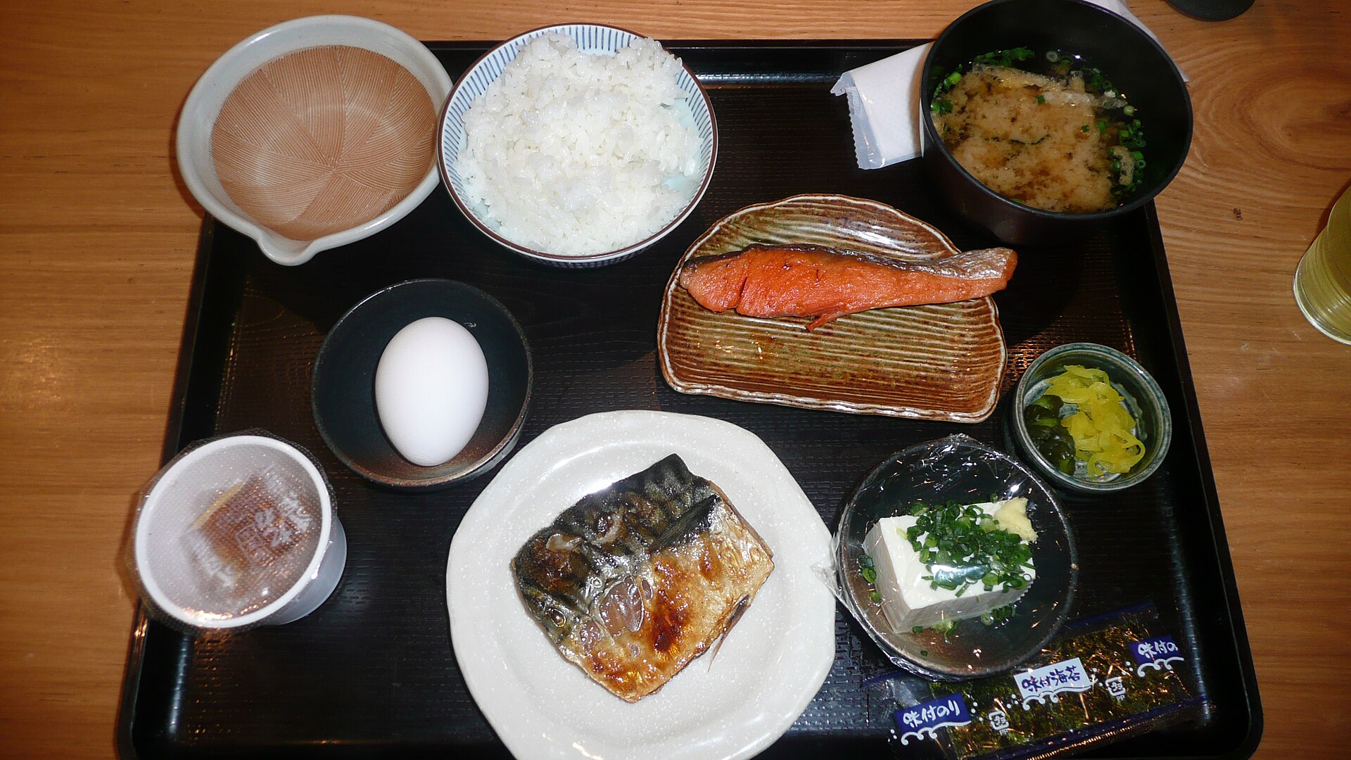 Japanese breakfast tray with grilled salmon, rice and miso soup