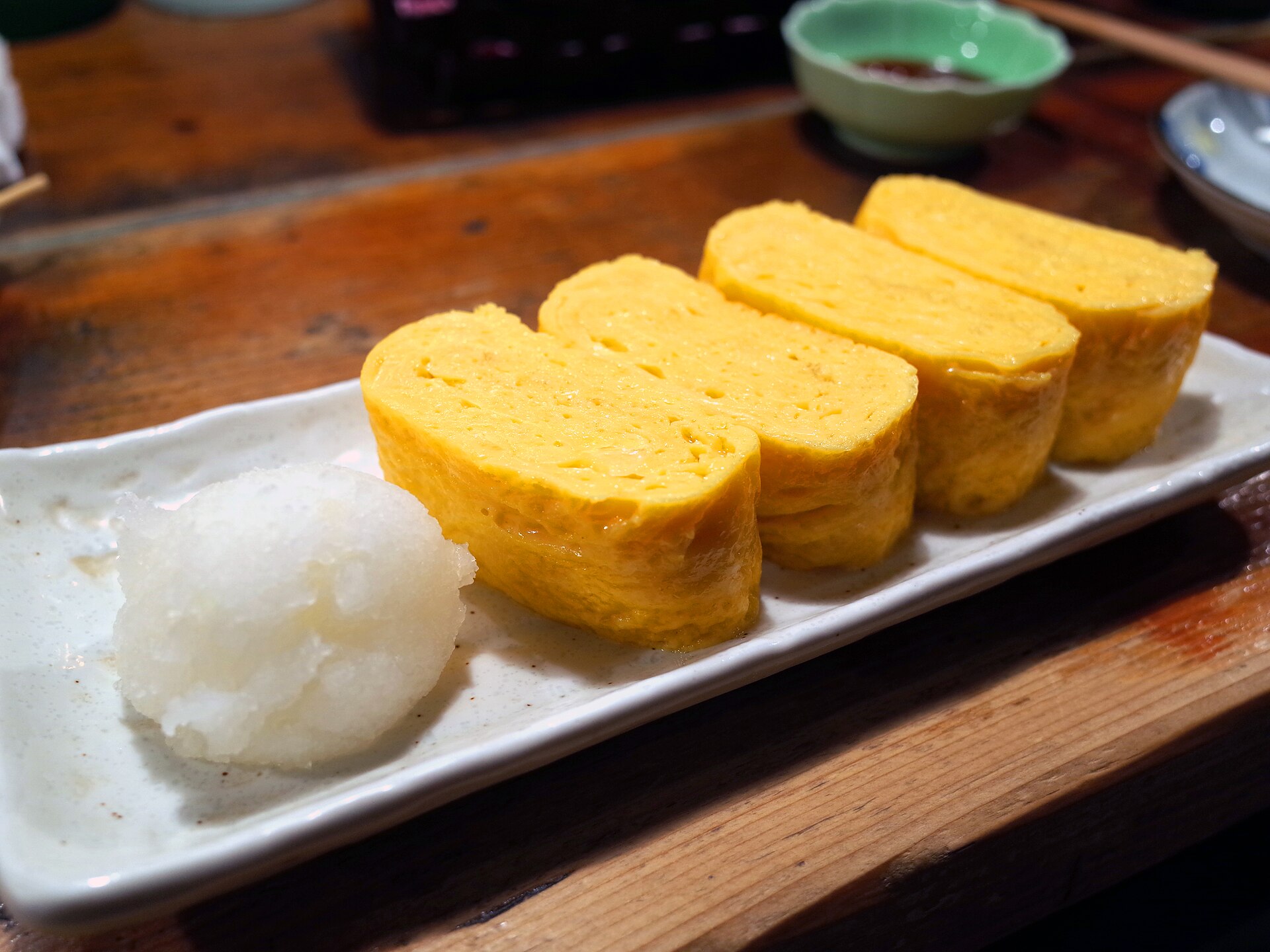Slices of tamagoyaki rolled omelet on a plate