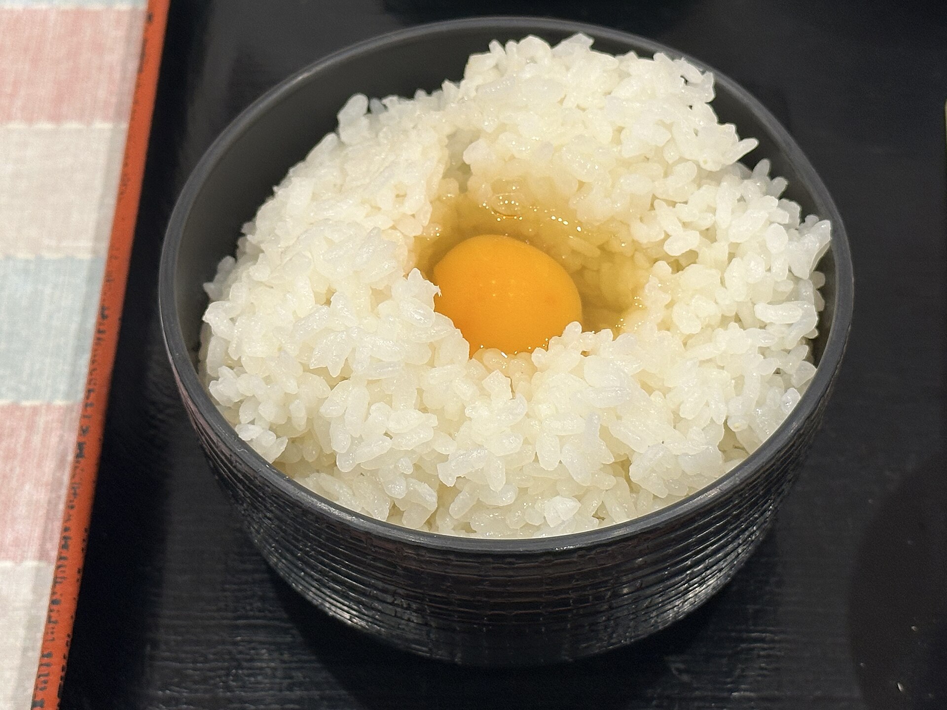 Tamago kake gohan, an egg yolk on hot rice