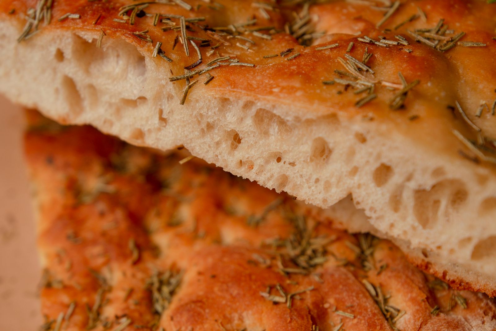 Golden focaccia topped with herbs, a keto bread swap