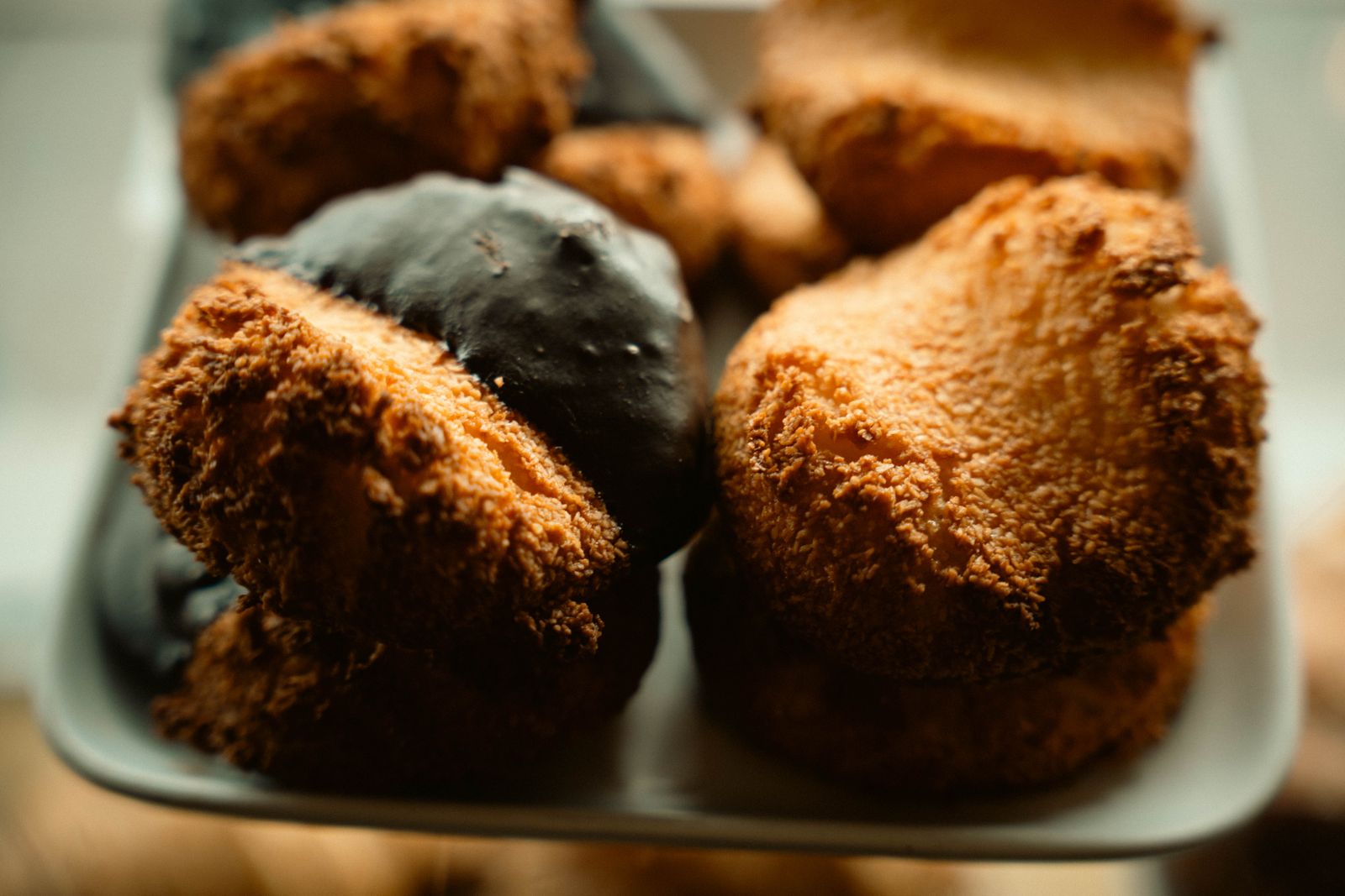 Coconut macaroons, some dipped in chocolate