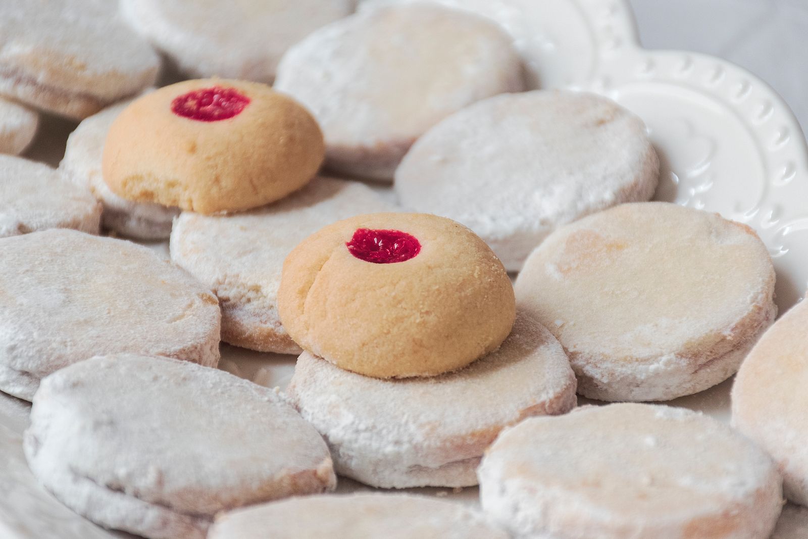 Thumbprint cookies with red jam centers