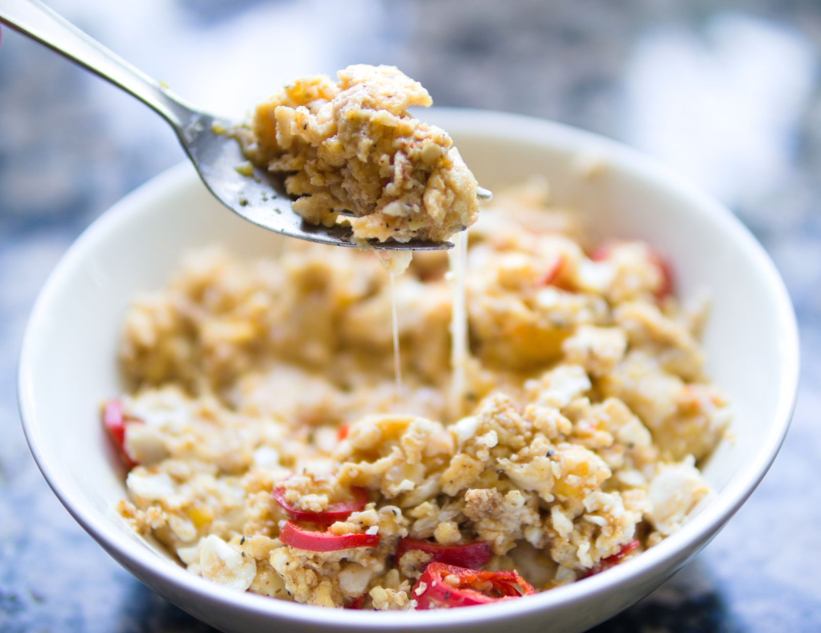 Cheesy savory oats and eggs bowl