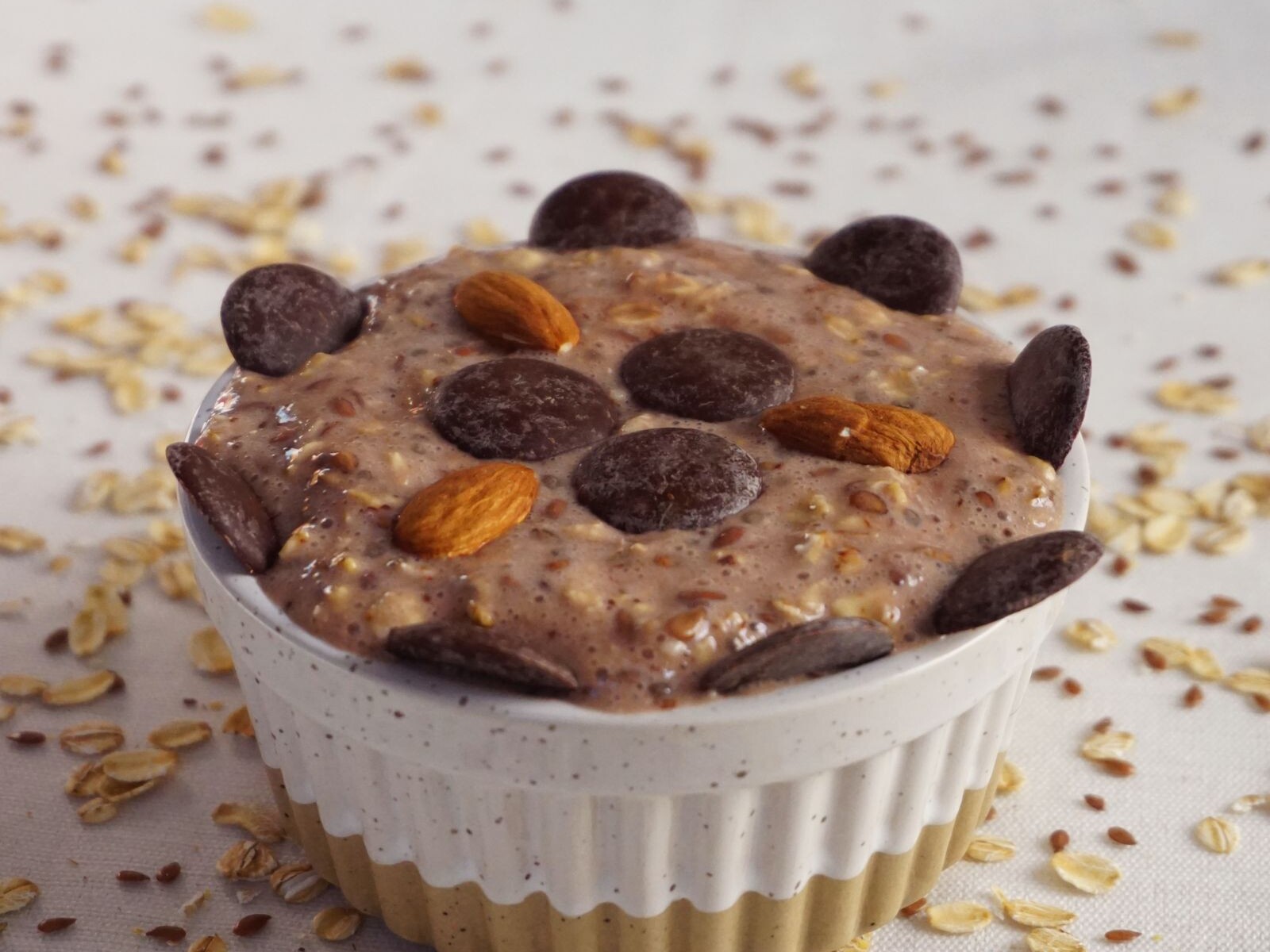 Baked chocolate oat cup with almonds