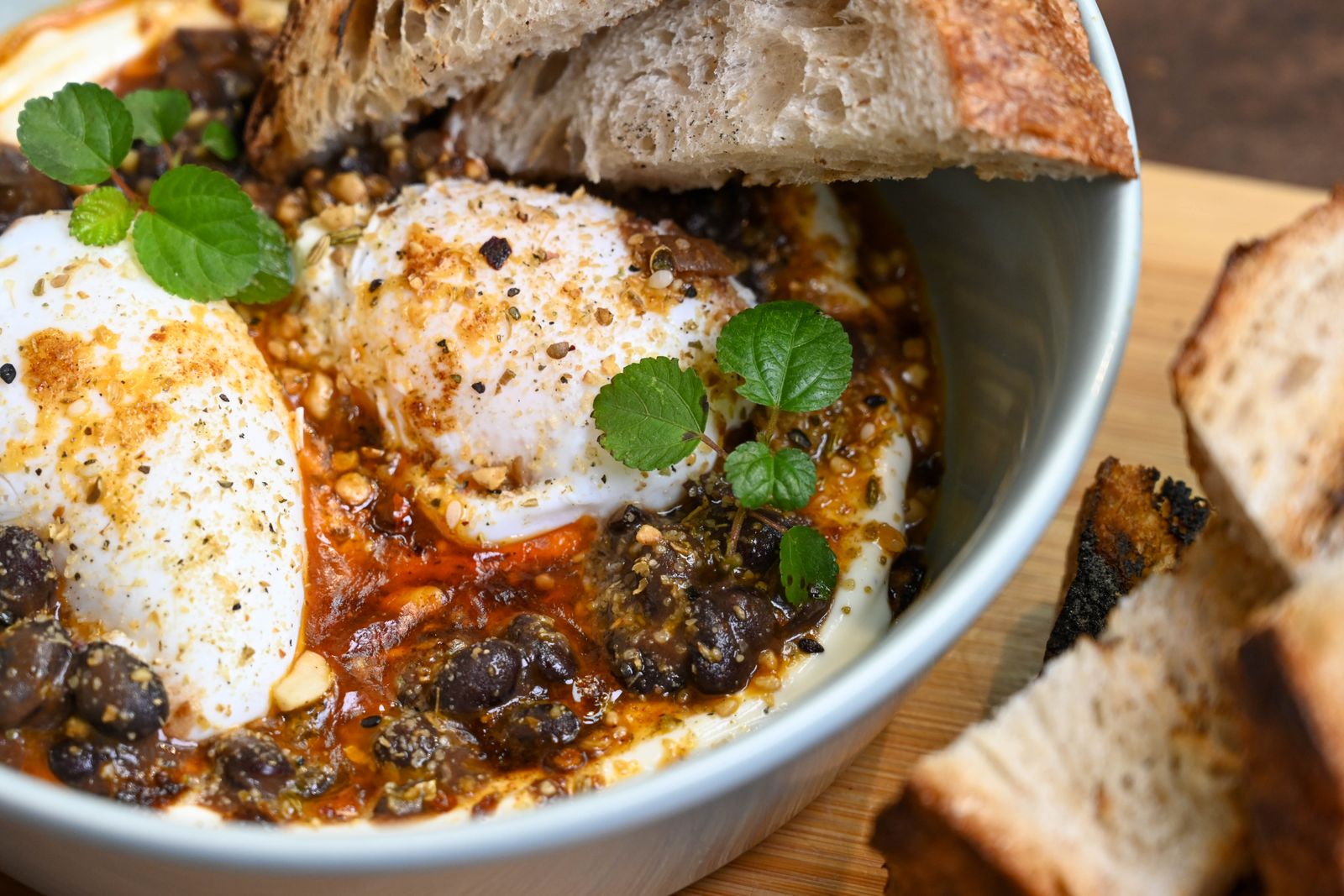 Shakshuka style eggs in a tomato and oat sauce