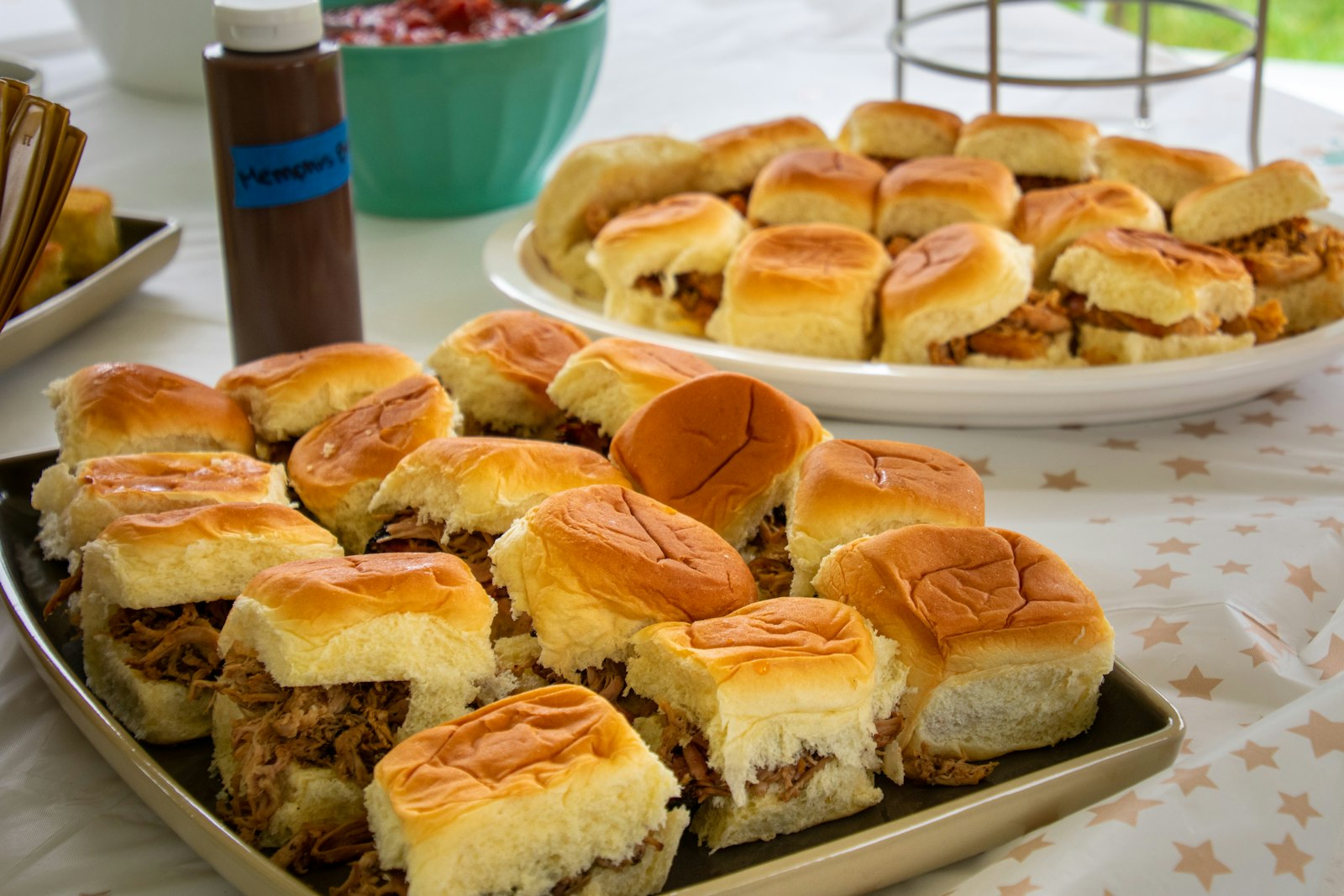 A tray of golden ham and cheese sliders