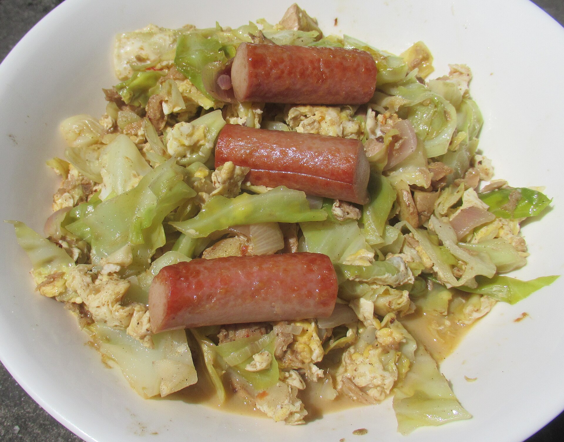 Smothered cabbage with sliced sausage