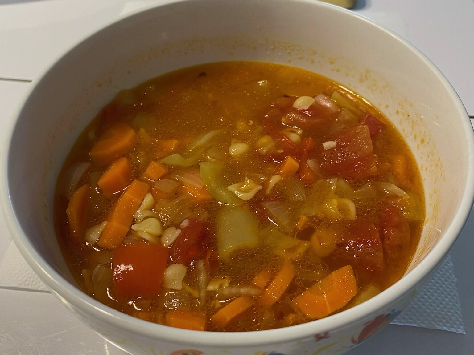 A big bowl of minestrone loaded with vegetables for volume eating
