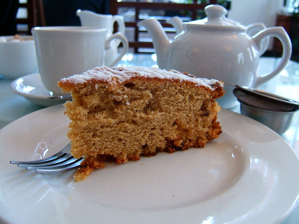 Squares of moist apple cake on a plate