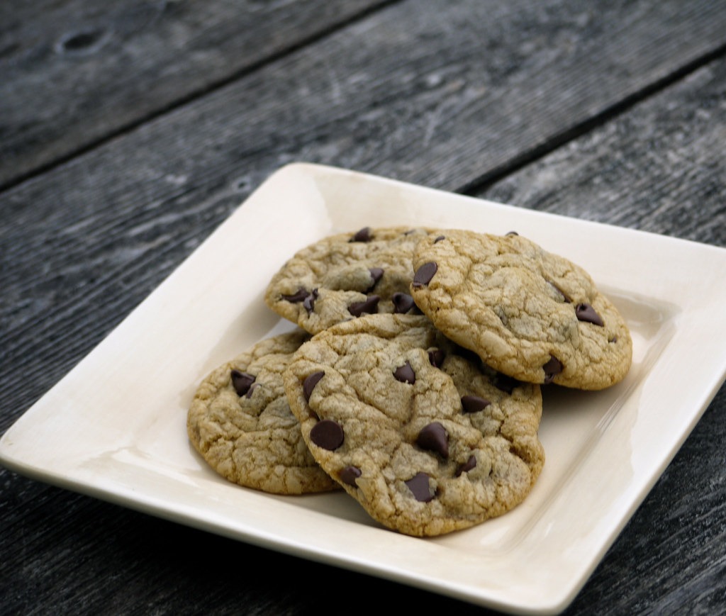 Brown butter chocolate chip cookies cooling on a rack