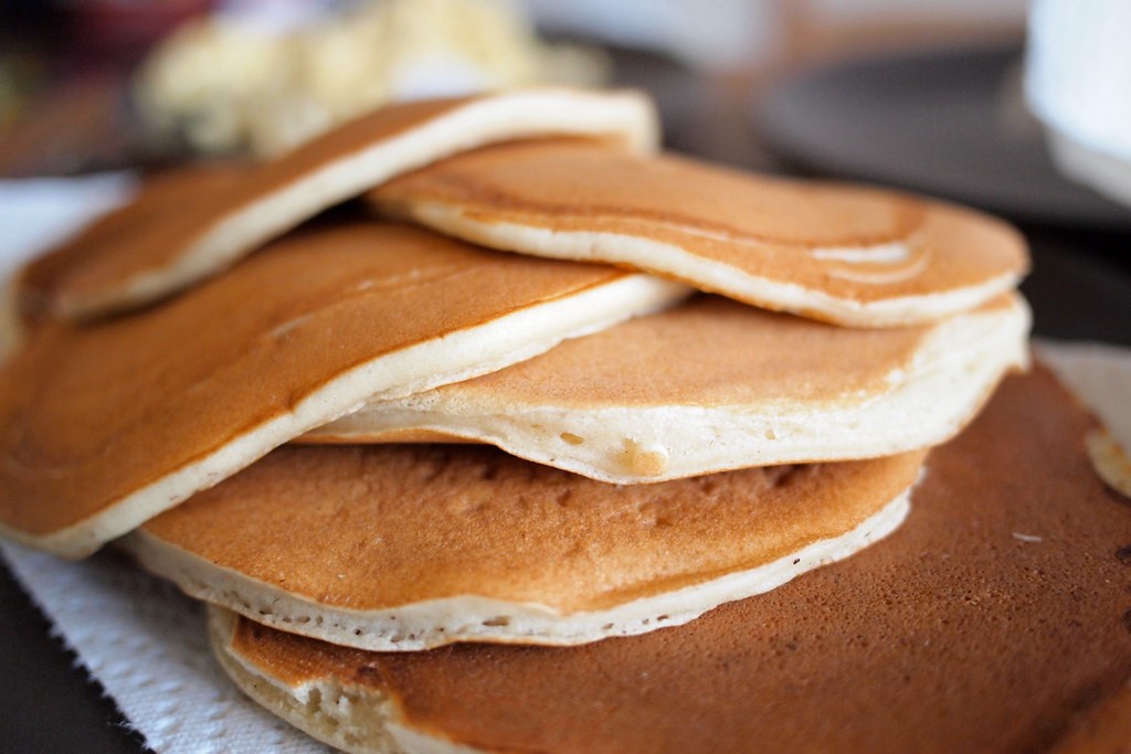 Stack of fluffy buttermilk pancakes on a plate