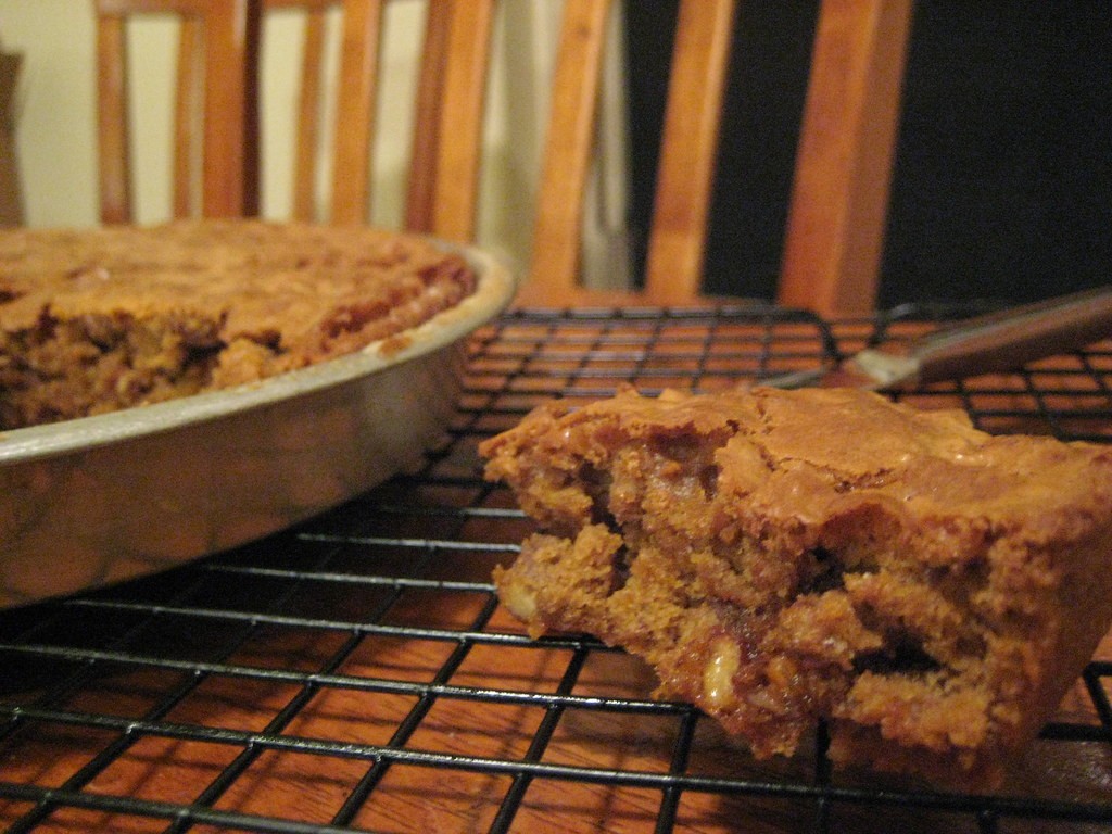 Chewy butterscotch blondies cut from a round pan