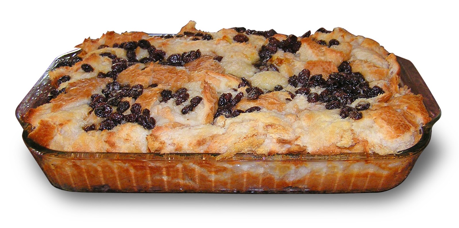Baked bread pudding with golden crispy corners