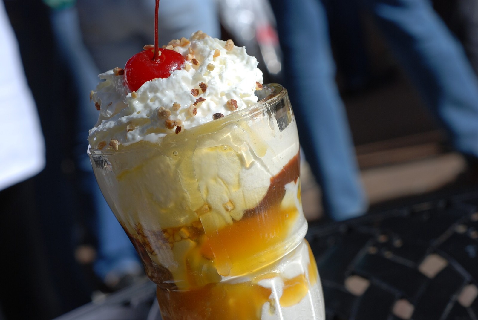 Vanilla ice cream sundae with warm butterscotch sauce
