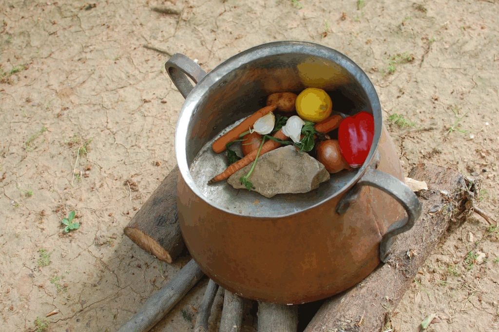 Pot of stone soup with vegetables, a celebrity mom recipe from Dolly Parton