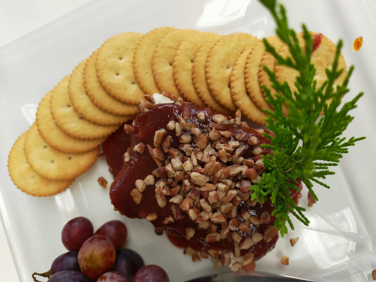Cranberry pecan cheese ball with crackers