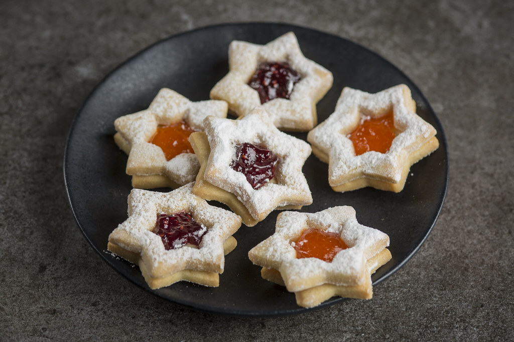 Star-shaped Linzer cookies with raspberry jam windows