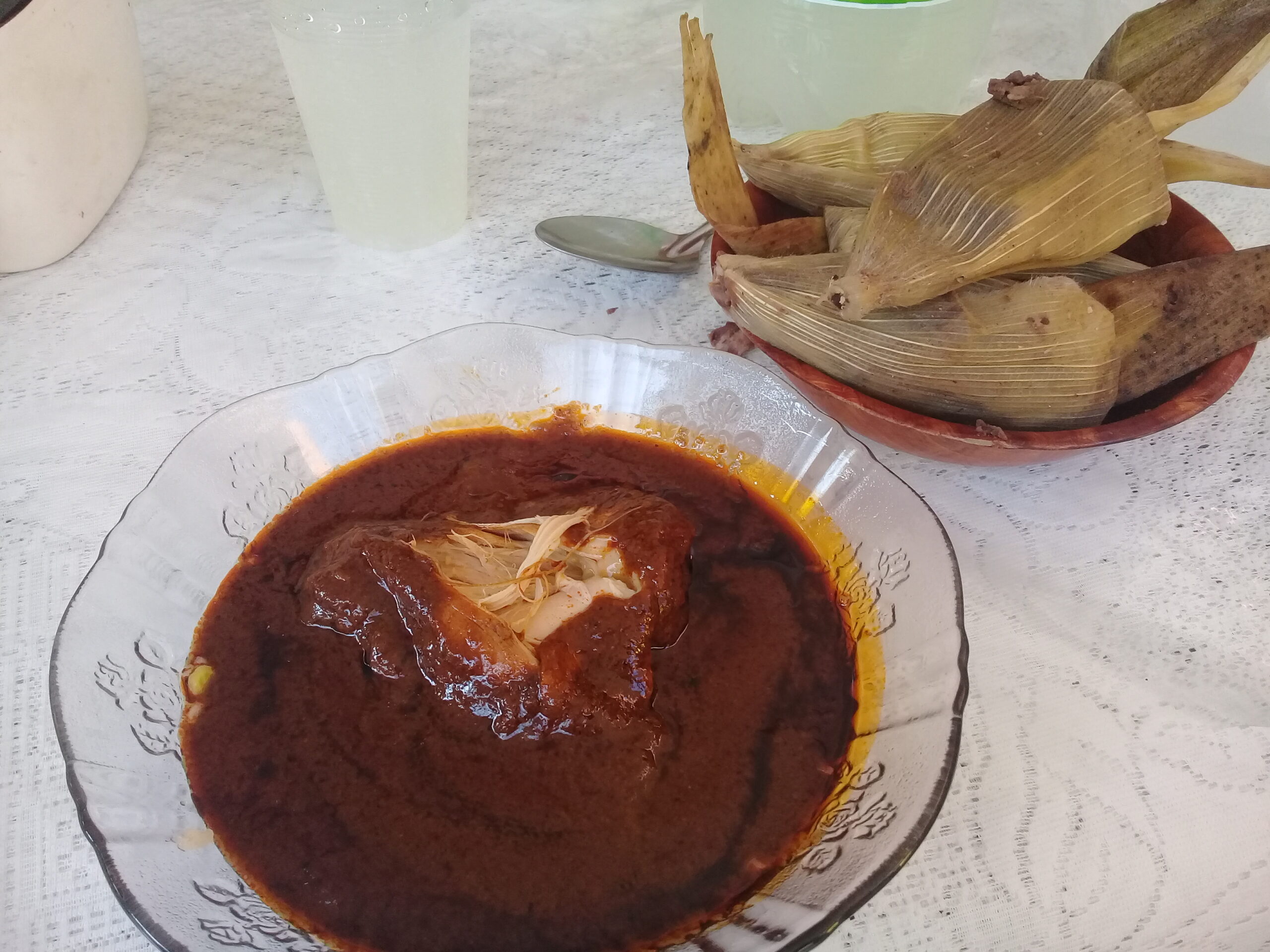 Bean tamal from Tlaxcala served with a bowl of mole