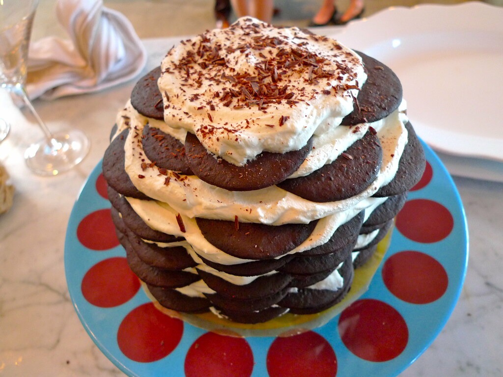Tall chocolate wafer icebox cake layered with whipped cream