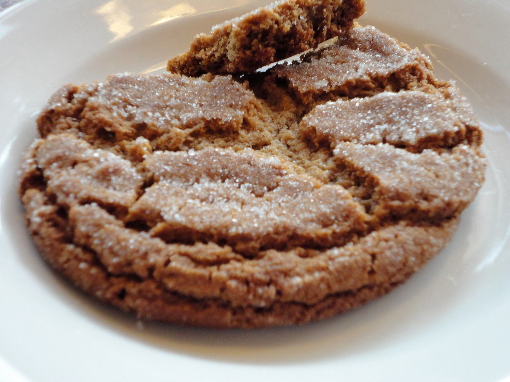 Big chewy molasses crinkle cookie with a cracked sugar top