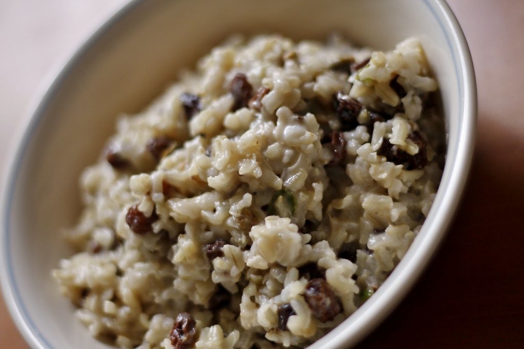 Bowl of creamy depression era rice pudding with raisins