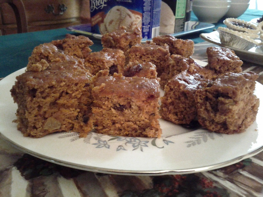 Squares of tomato soup spice cake on a plate, a vintage depression era dessert