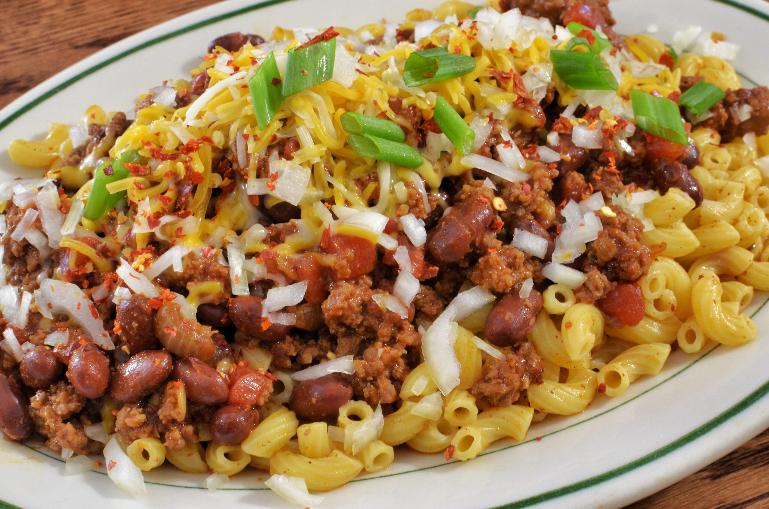 Chili mac with ground beef and melted cheese