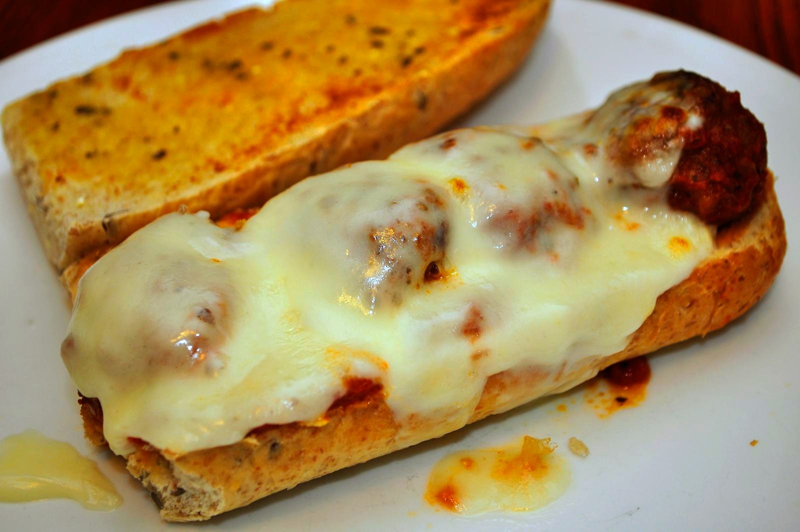 Slow cooker dump dinners meatball sub with marinara and cheese