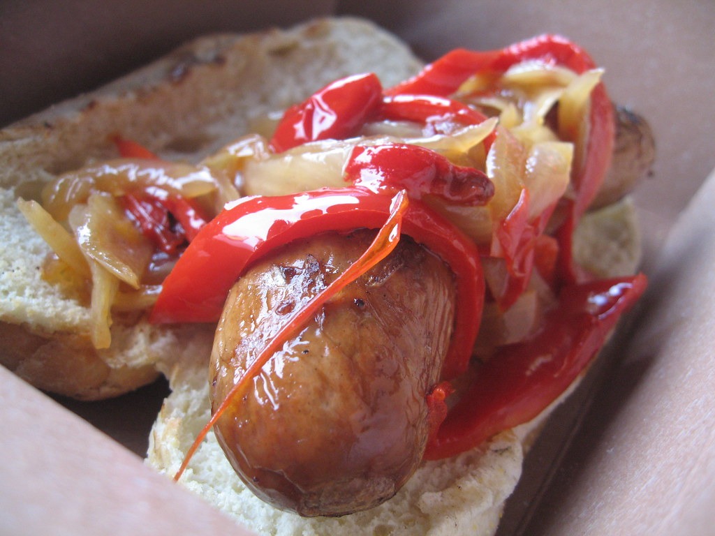 Beer brats with peppers and onions from Guy Fieri recipes