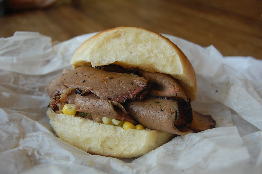 Barbecue brisket sandwich on a toasted bun with slaw