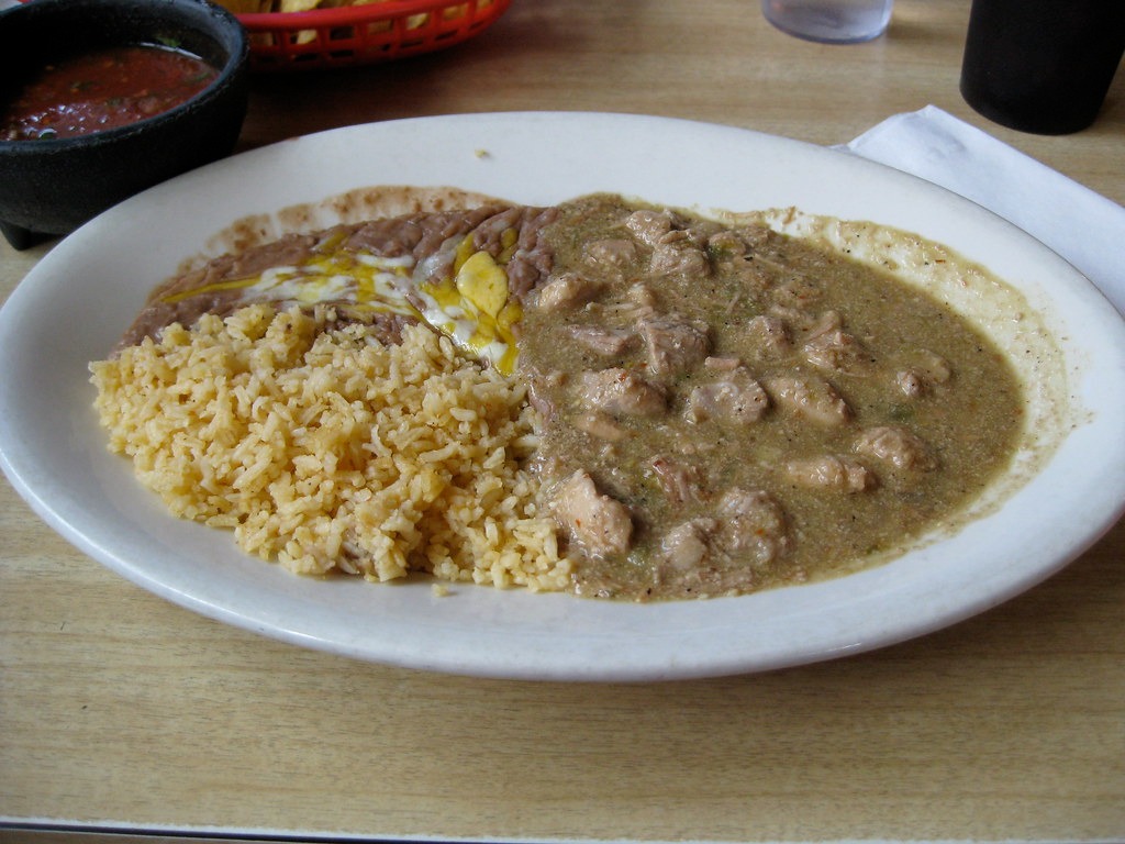 Bowl of green pork chile verde stew