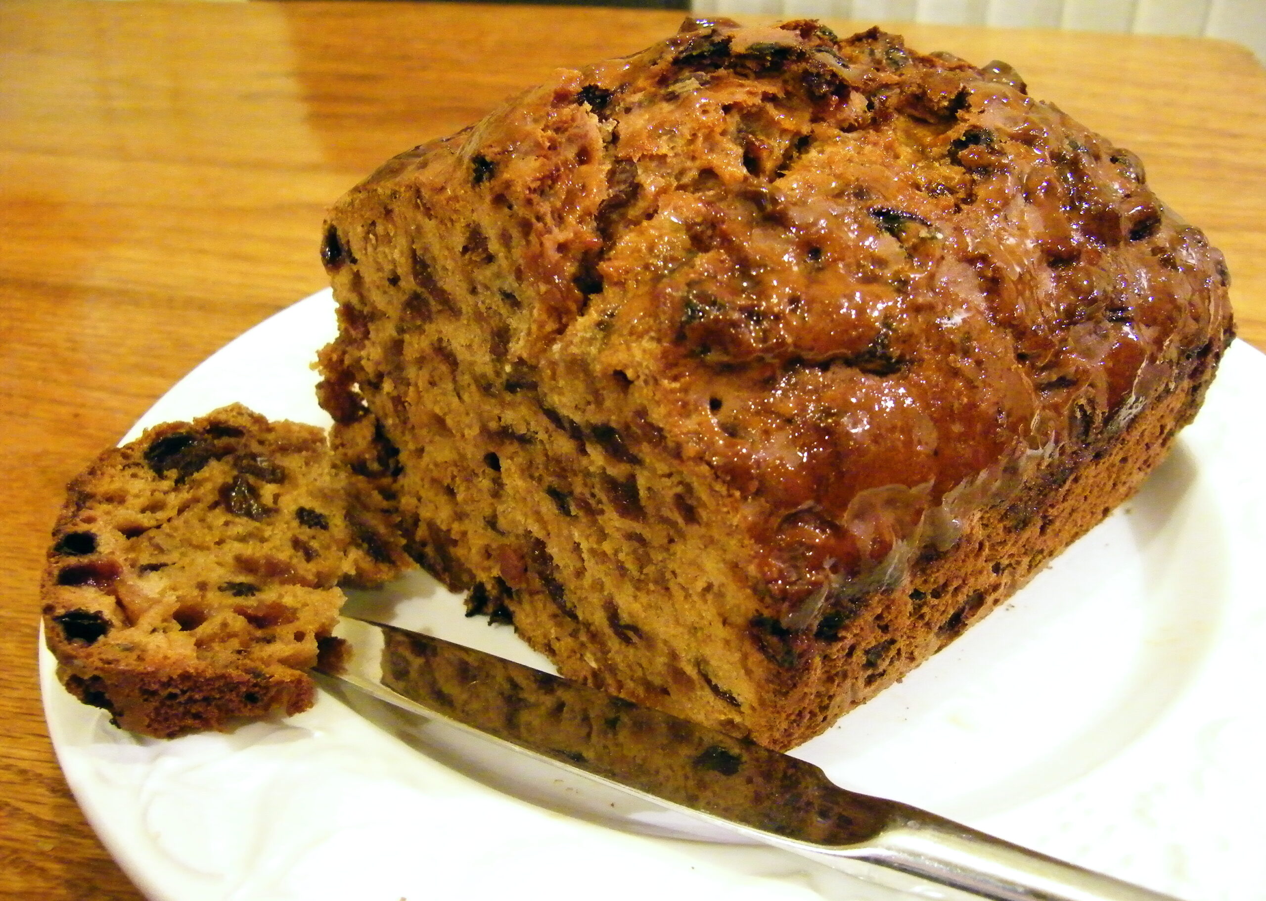 Welsh bara brith tea loaf with a slice cut
