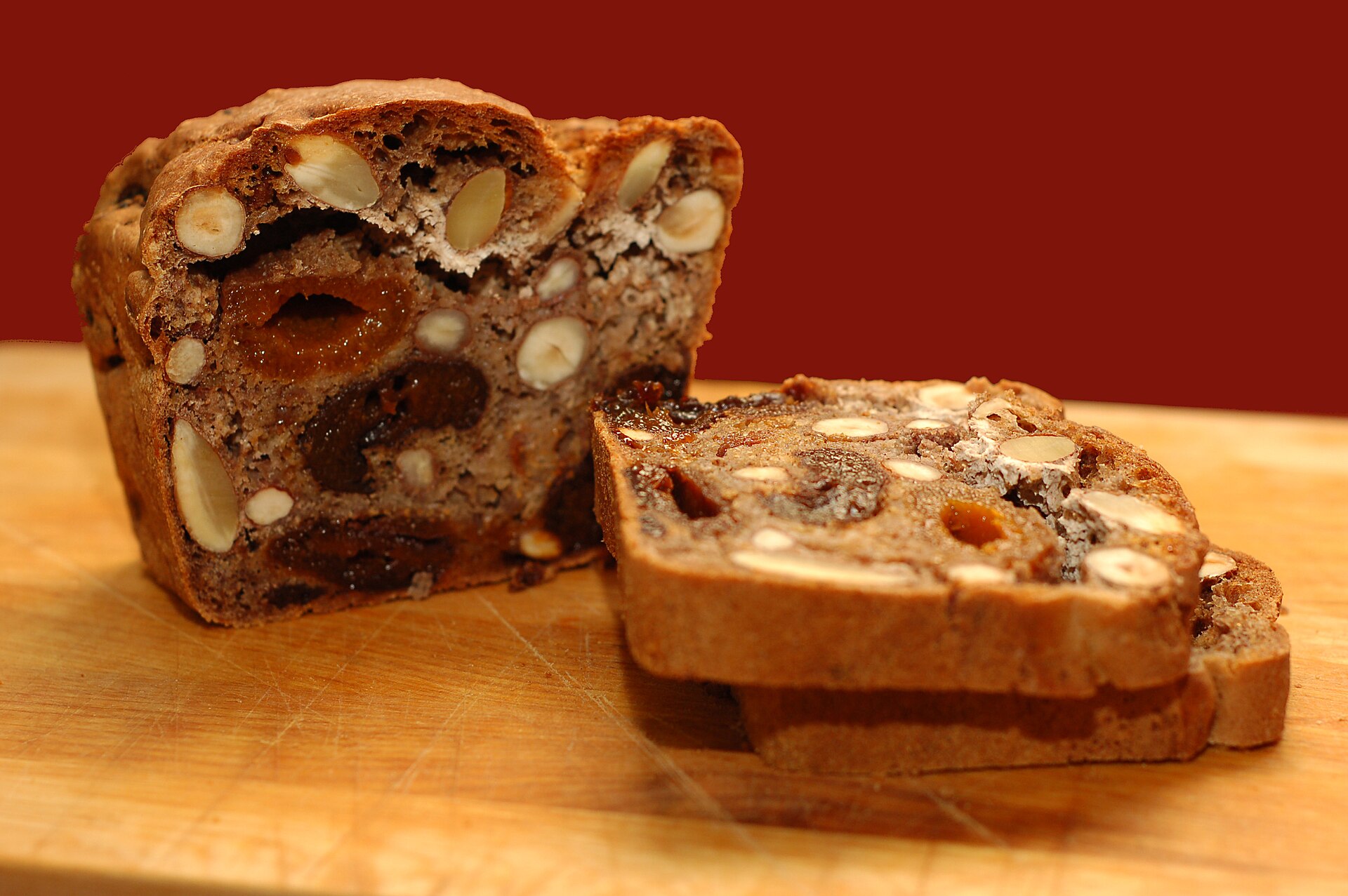 Sliced German fruit bread packed with dried figs, pears and nuts