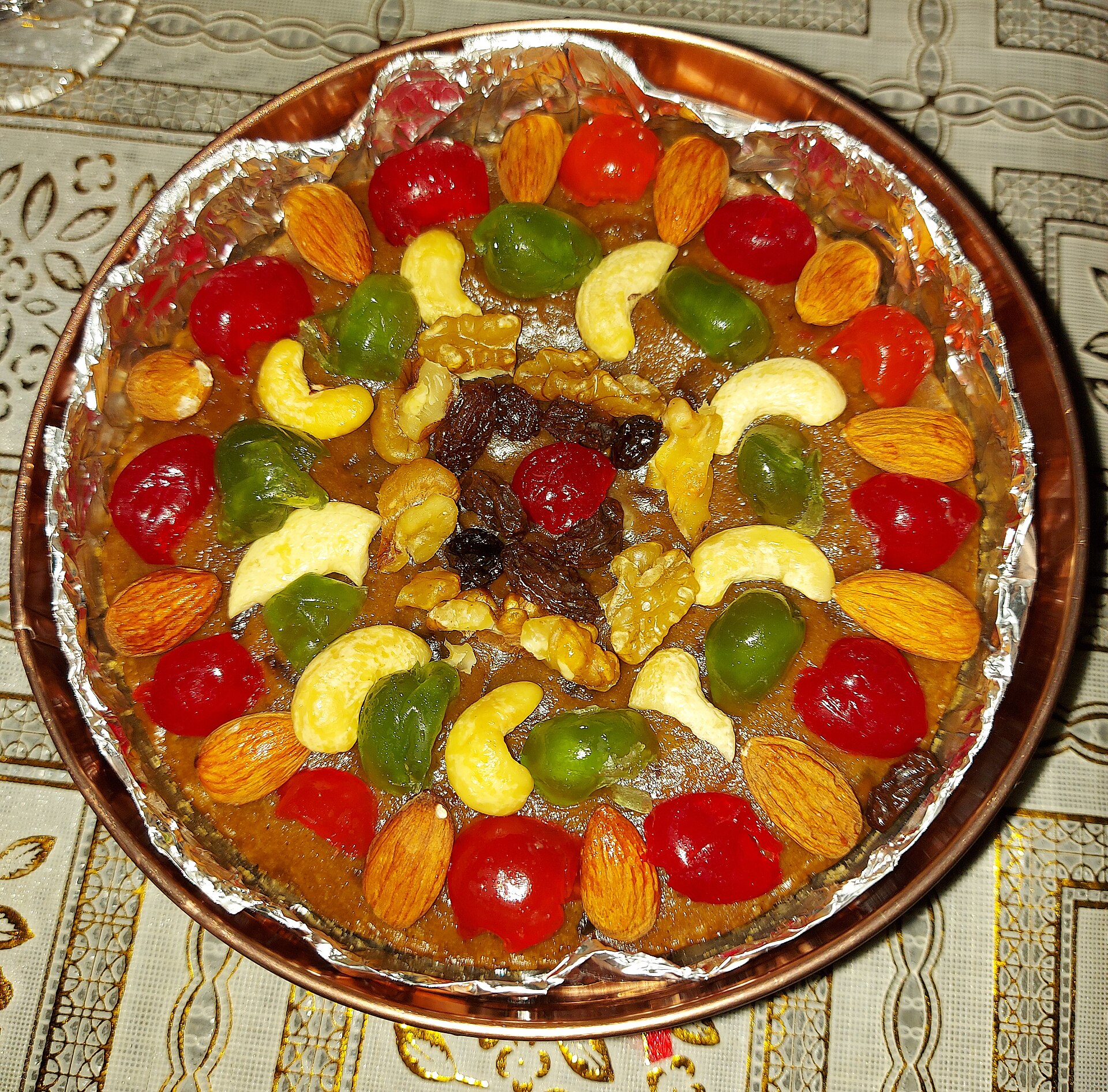 Georgia style fruitcake topped with candied cherries and nuts