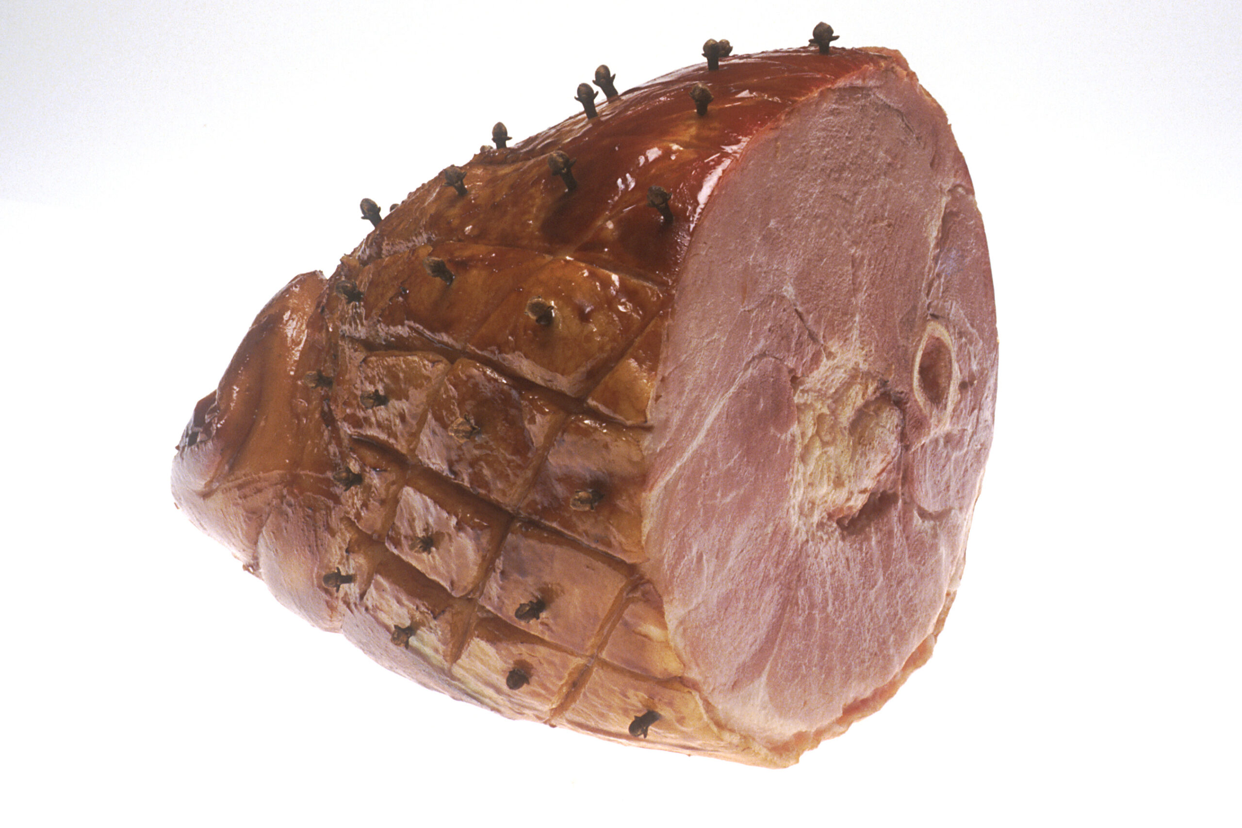 Clove studded ham ready for carving