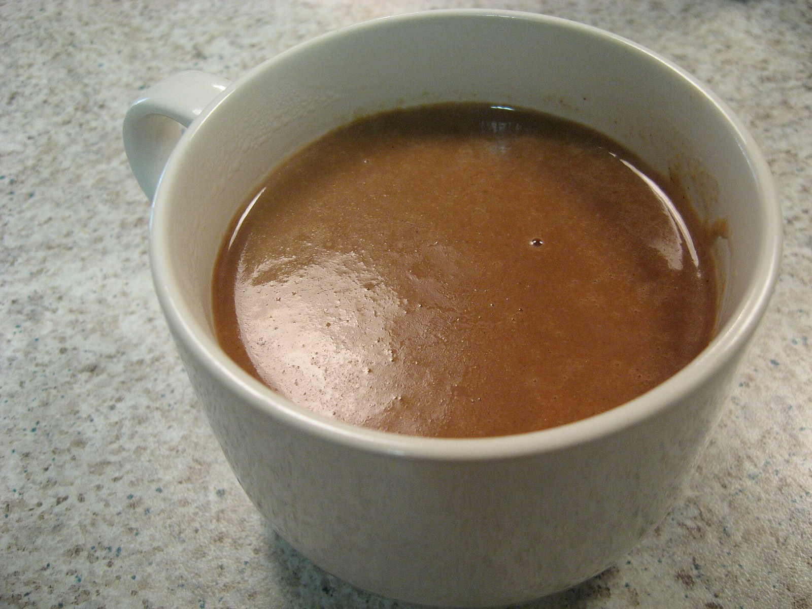 Cup of thick champurrado chocolate drink