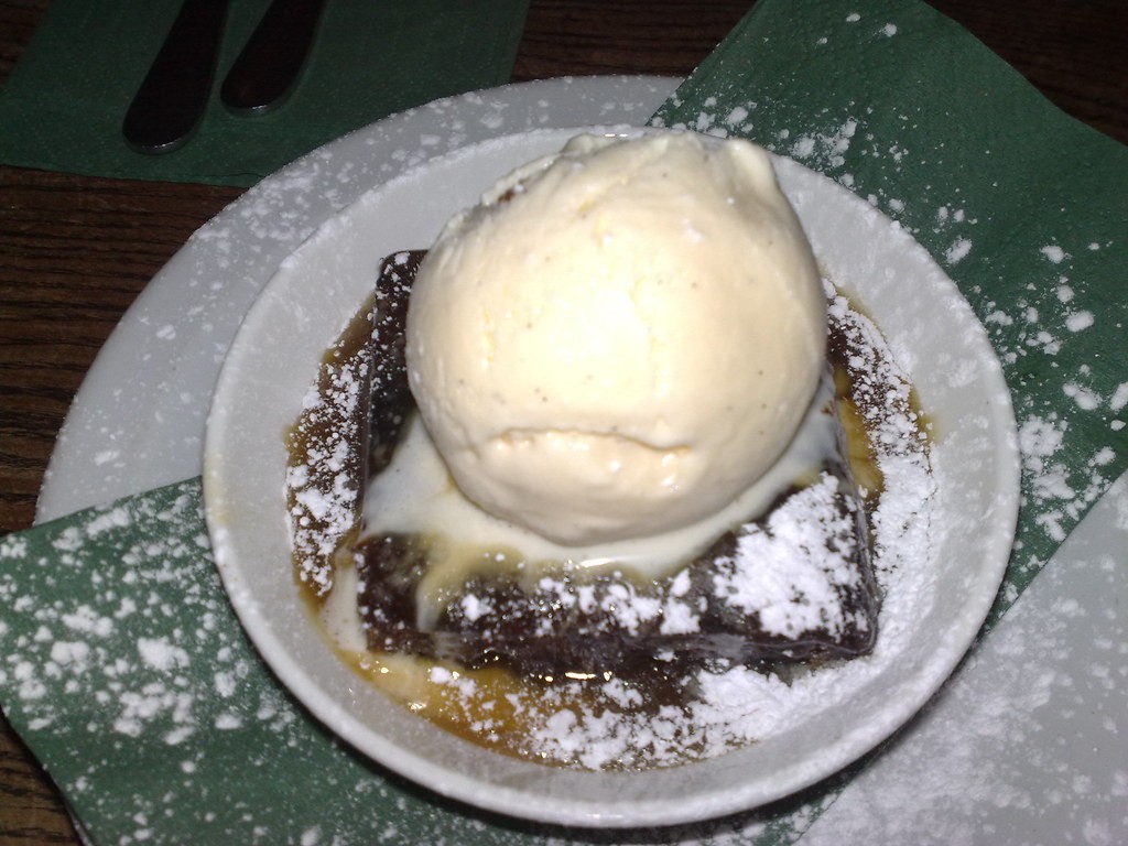 Sticky toffee pudding with vanilla ice cream and toffee sauce