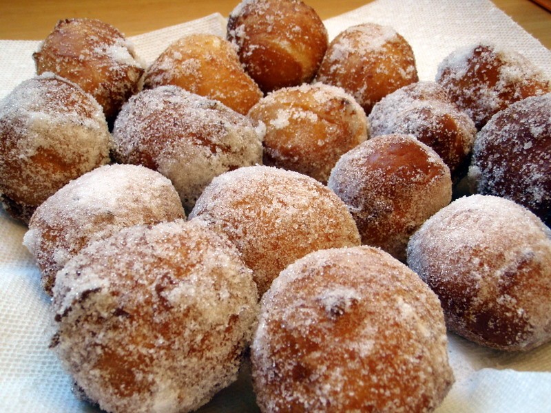 Selena Gomez recipes like sugar coated Hawaiian malasadas piled on a plate