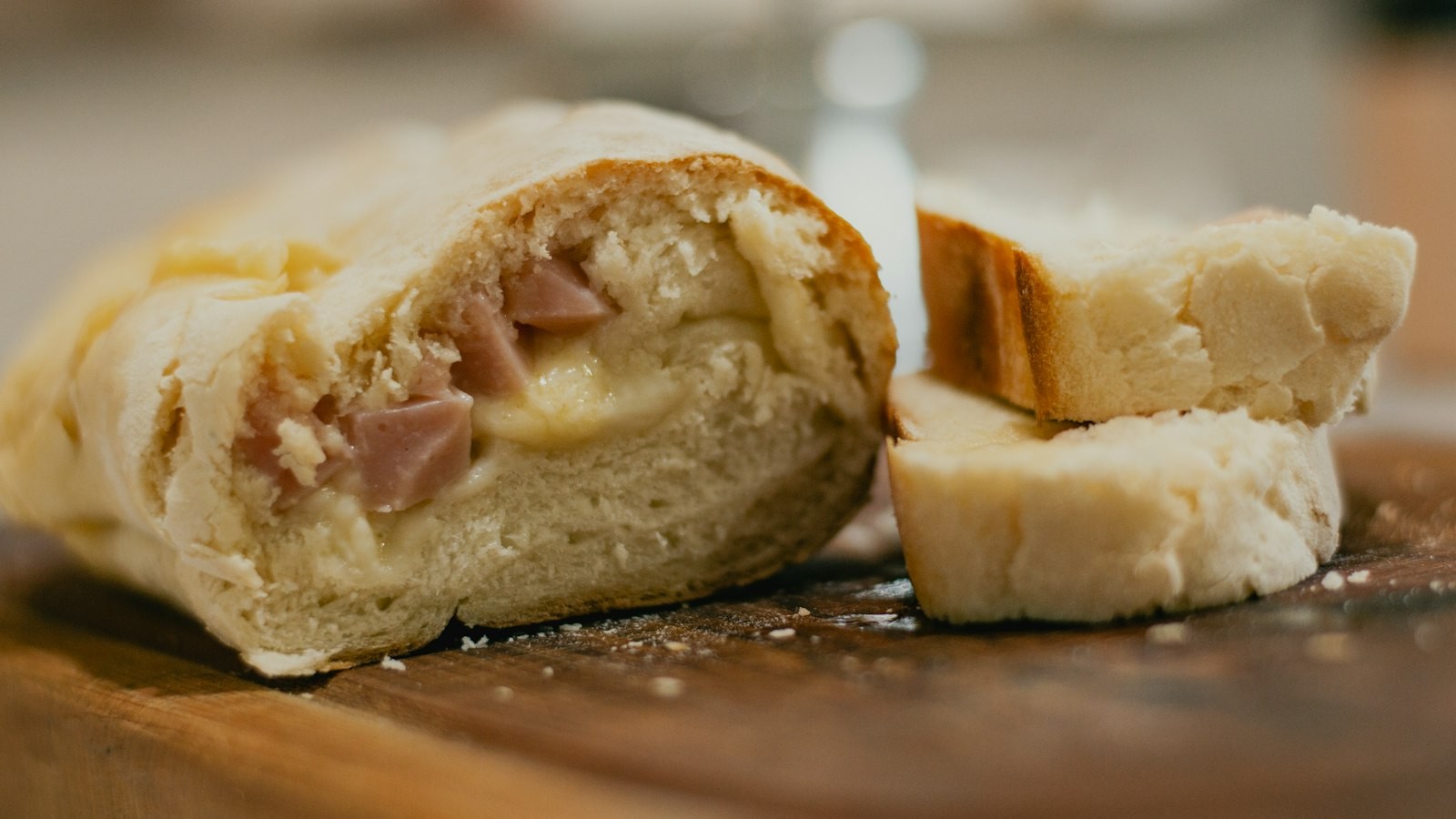 Ham and Swiss cheese rolled bread cut open to show the filling