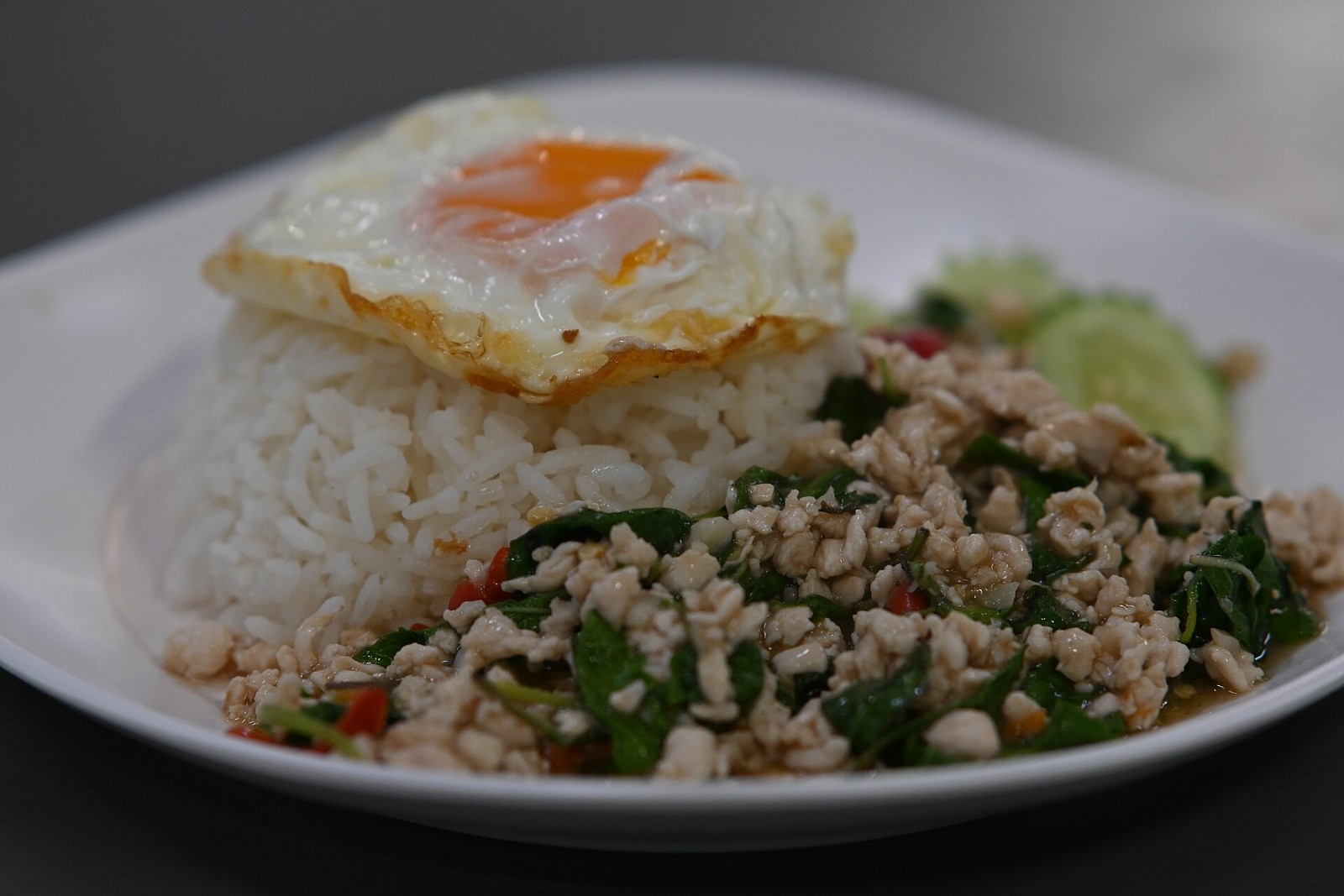 Thai basil minced chicken with rice and a runny fried egg