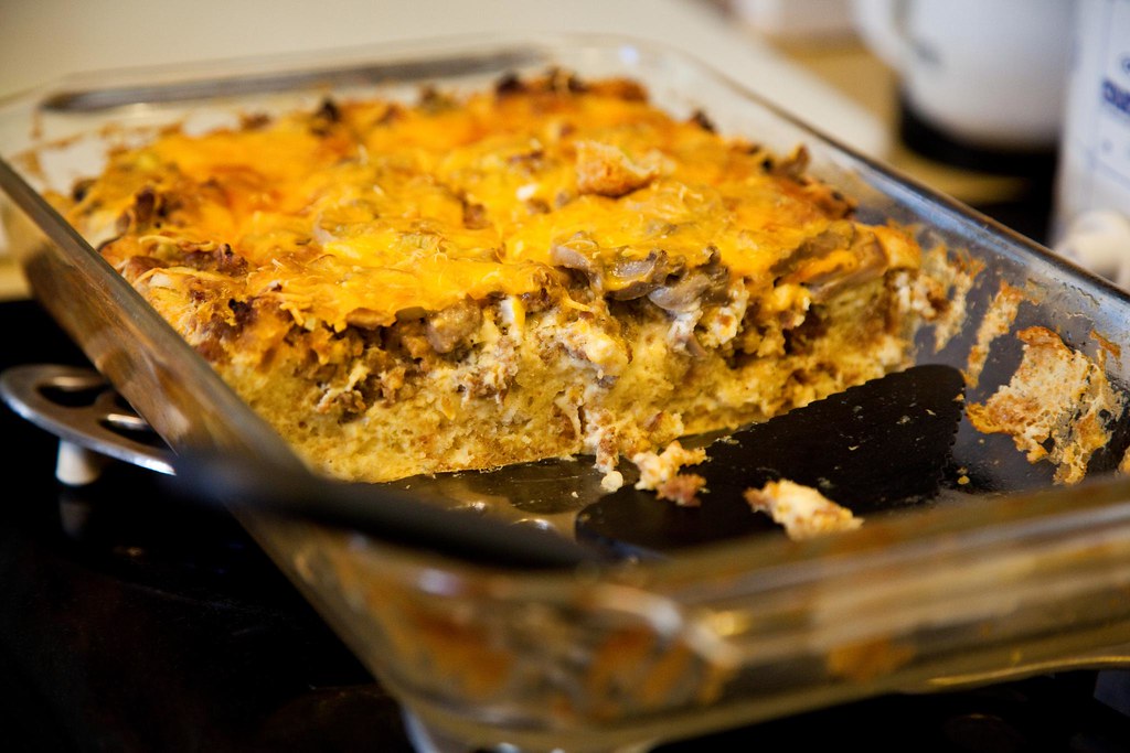 Cheesy baked breakfast casserole in a glass dish