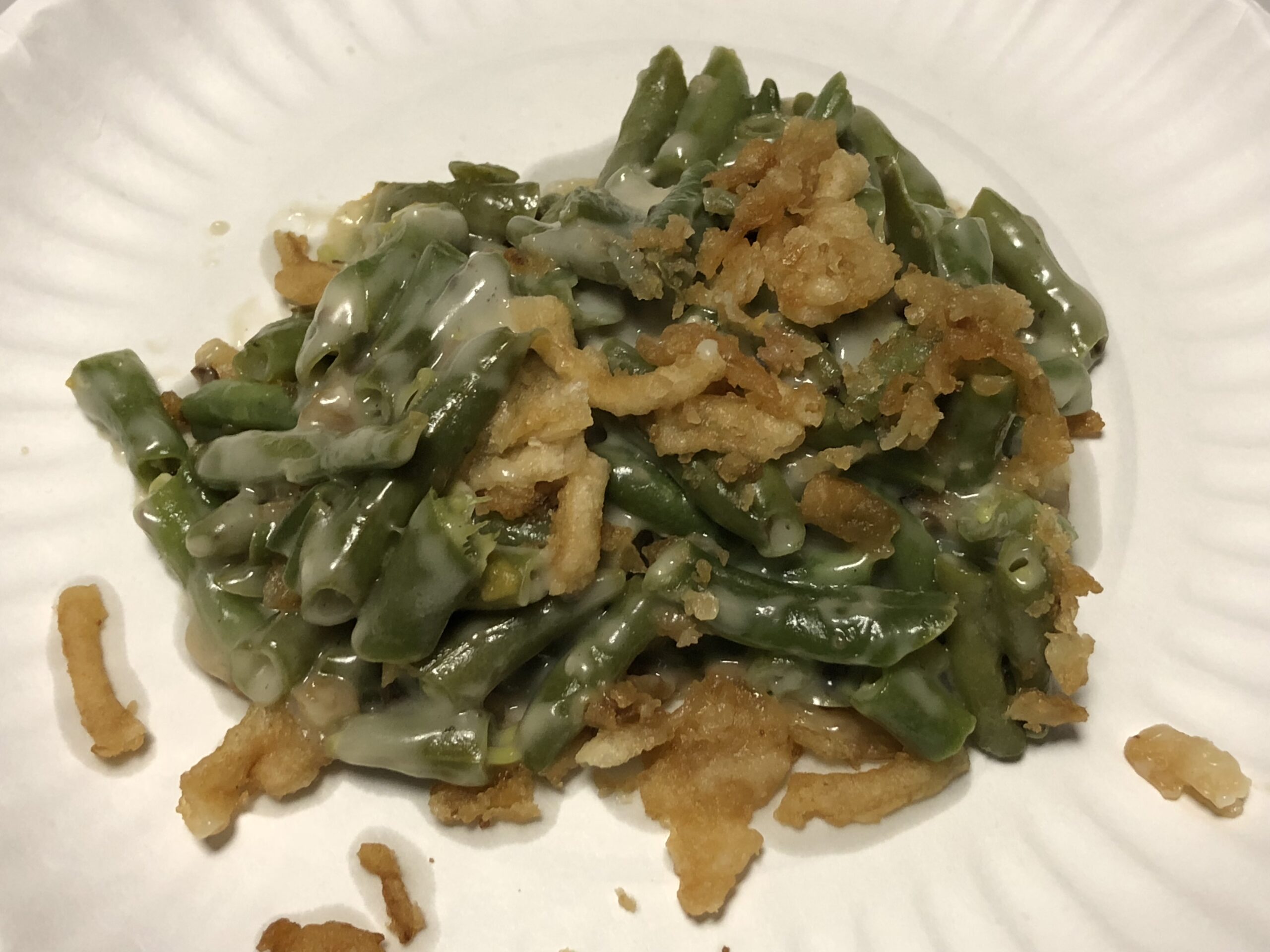 Green bean casserole topped with crispy fried onions