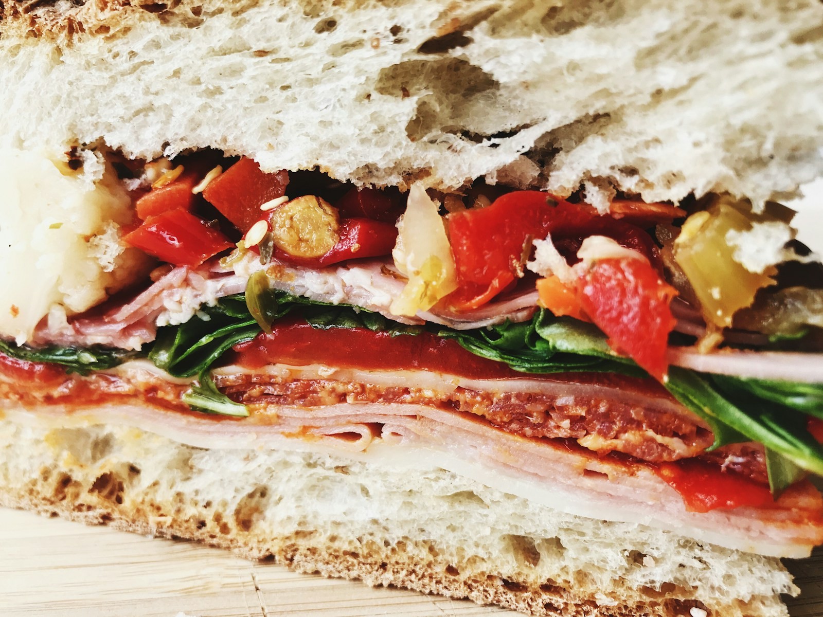 Chopped Italian sandwich with salami, ham, provolone and peppers