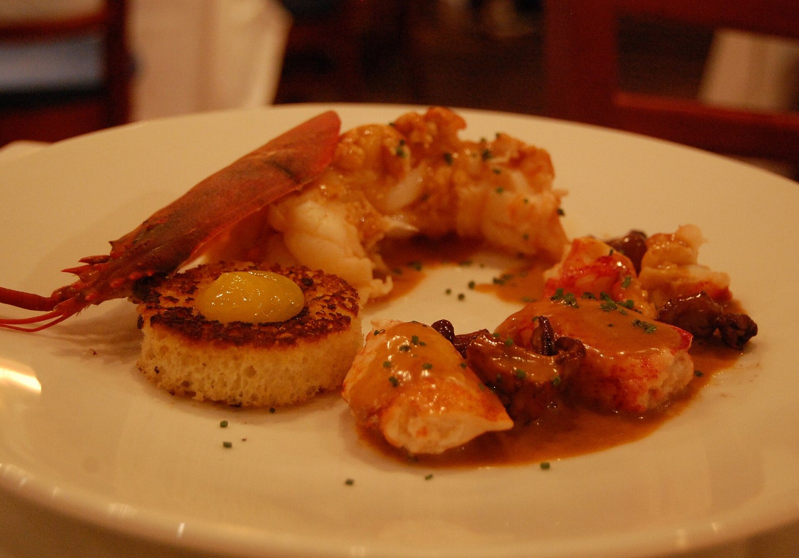 Lobster Newburg in a creamy sauce served on a plate