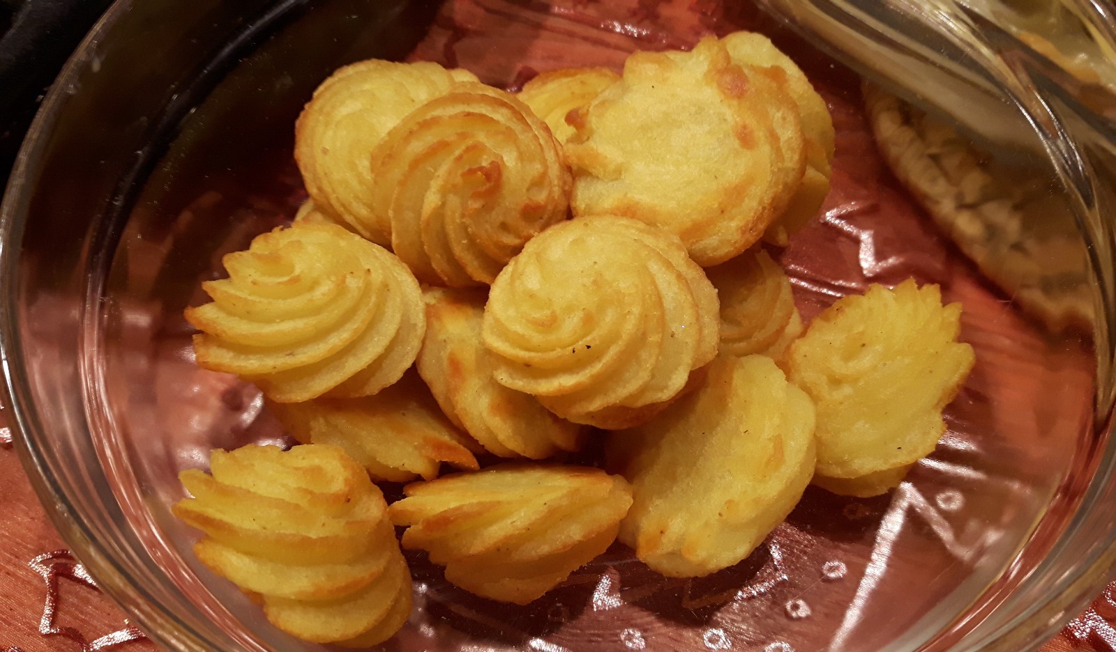 Golden piped duchess potatoes for a festive side dish