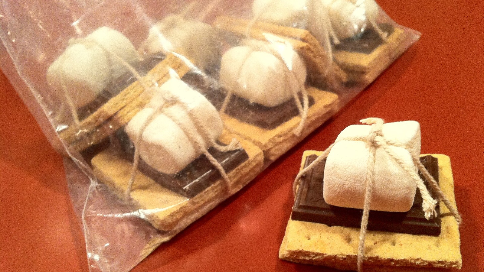 Graham crackers, chocolate and marshmallows tied with twine as gifts